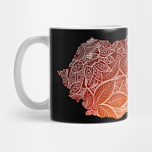 Colorful mandala art map of Romania with text in brown and orange Mug